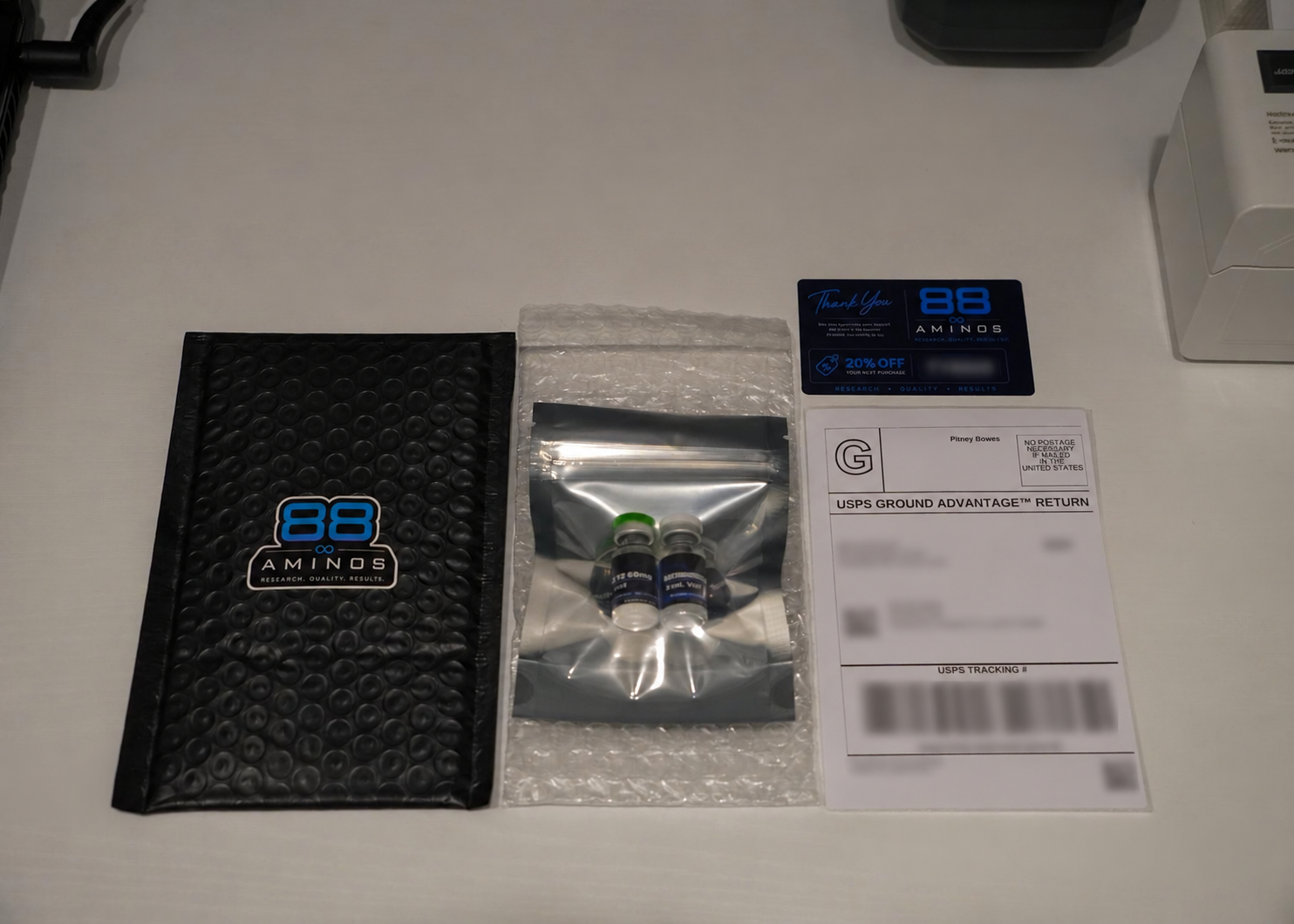 88 Aminos branded mailer, packaged research vials, and shipping materials